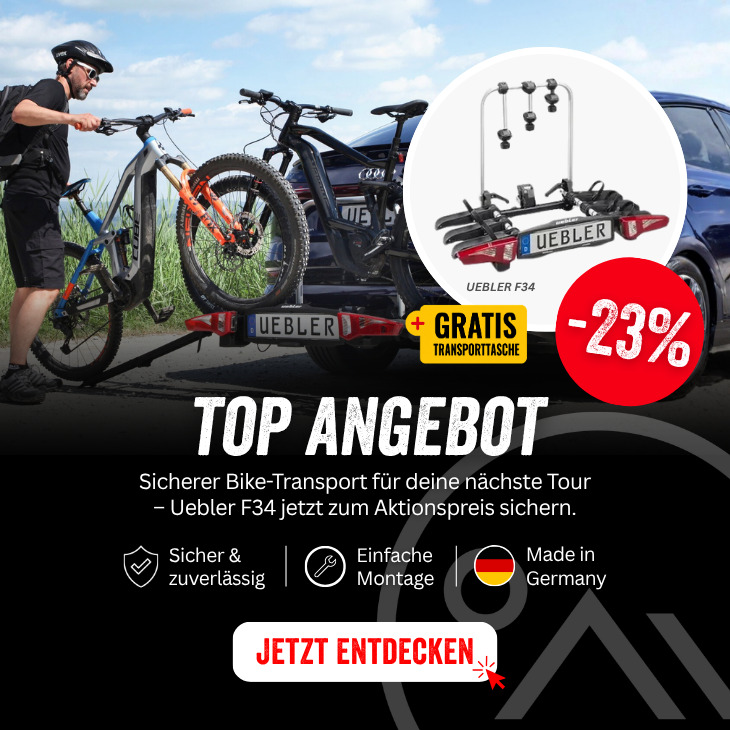 Aktionsbanner für den Uebler F34 Fahrradträger mit 23 Prozent Rabatt. Eine Transporttasche ist kostenlos dabei.
